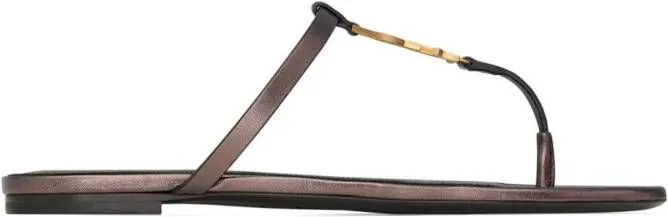 Saint Laurent Cassandra leather flip flops Brown