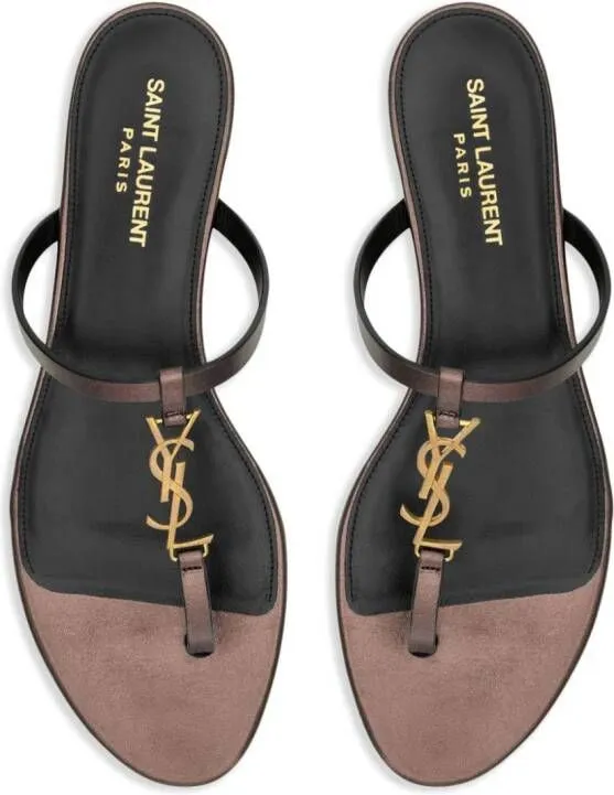 Saint Laurent Cassandra leather flip flops Brown